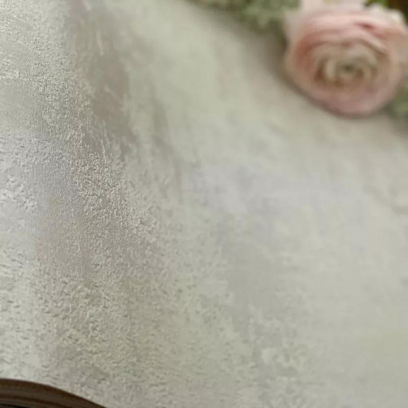 Bézs koptatott felületű gyöngyház fényű vlies design tapéta mosható vinyl felülettel
