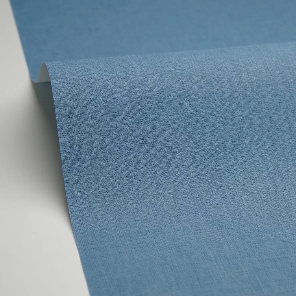 Egyszínű textil mintás design tapéta kék színben