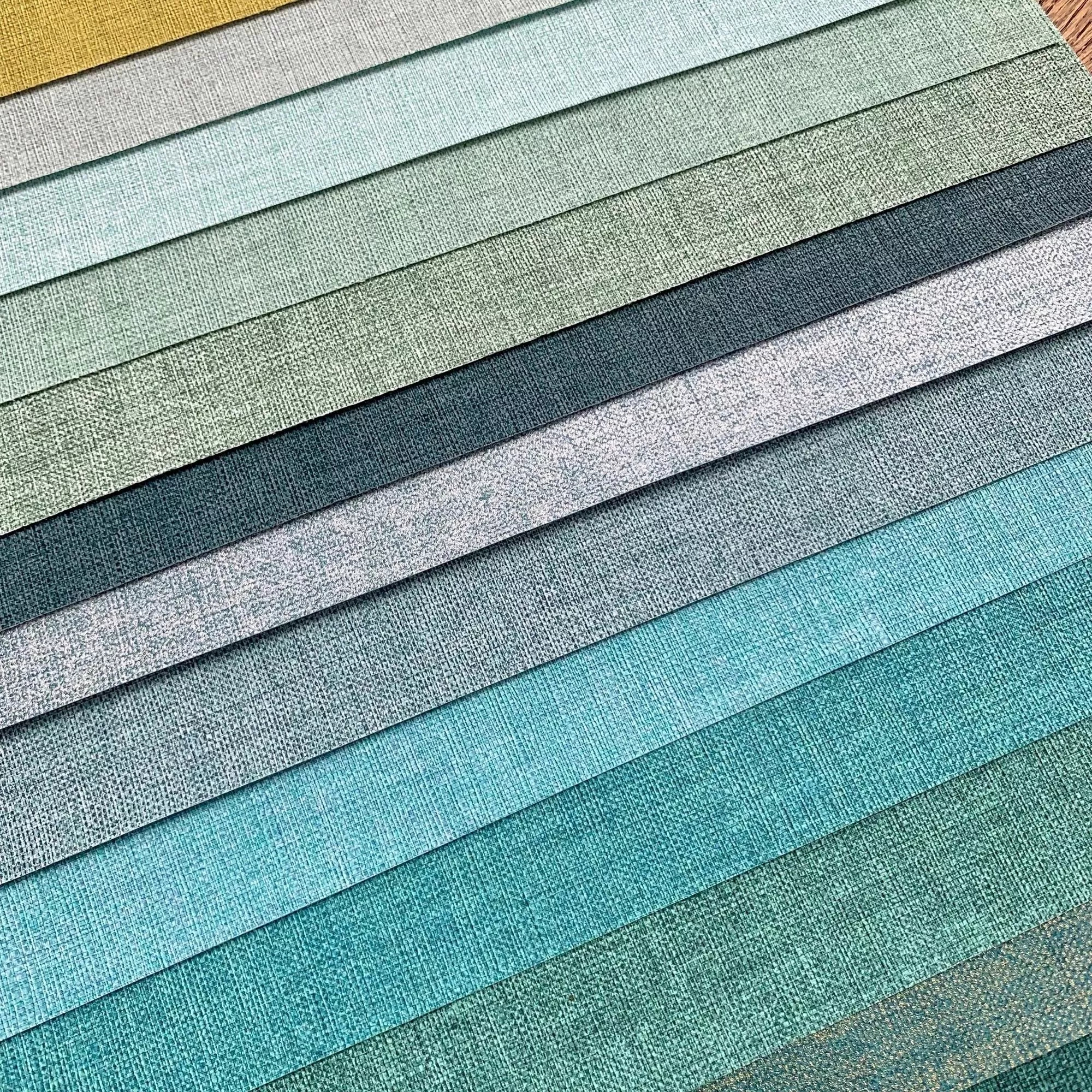 Halványszürke textilhatású vlies design tapéta