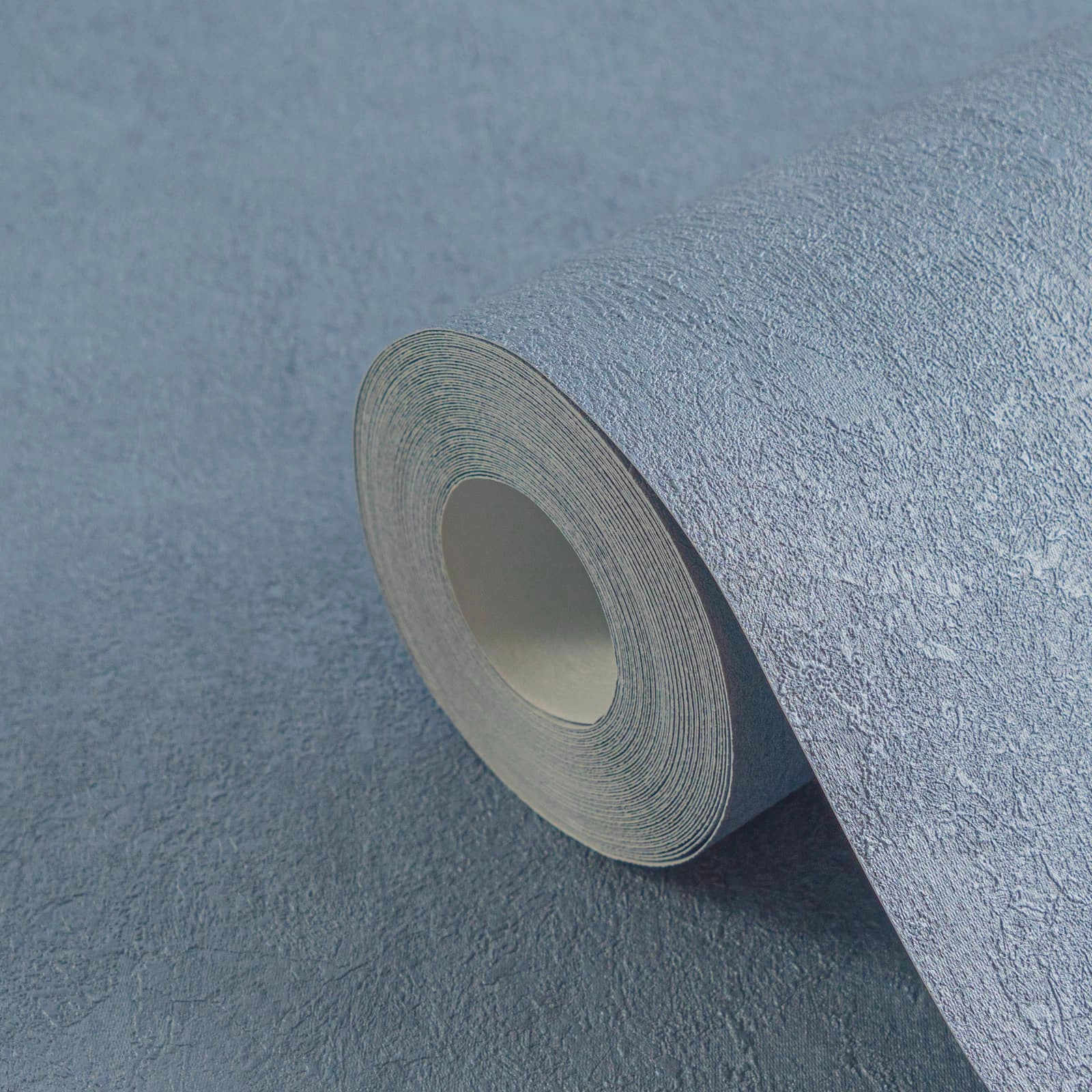 Stukrtúrált beton hatású kék design tapéta