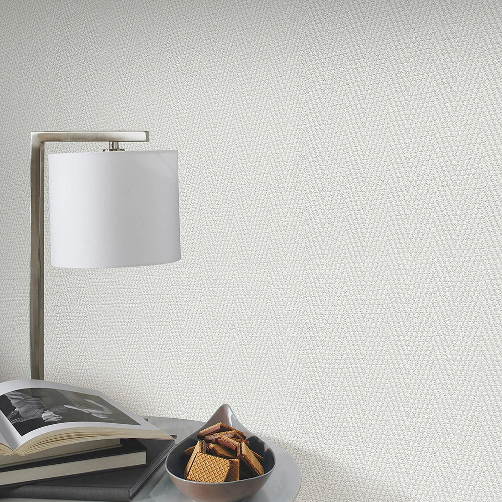 Szövethatású halszálka mintás törtfehér színű design tapéta