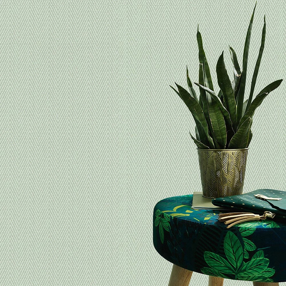 Szövethatású halszálka mintás világoszöld színű design tapéta