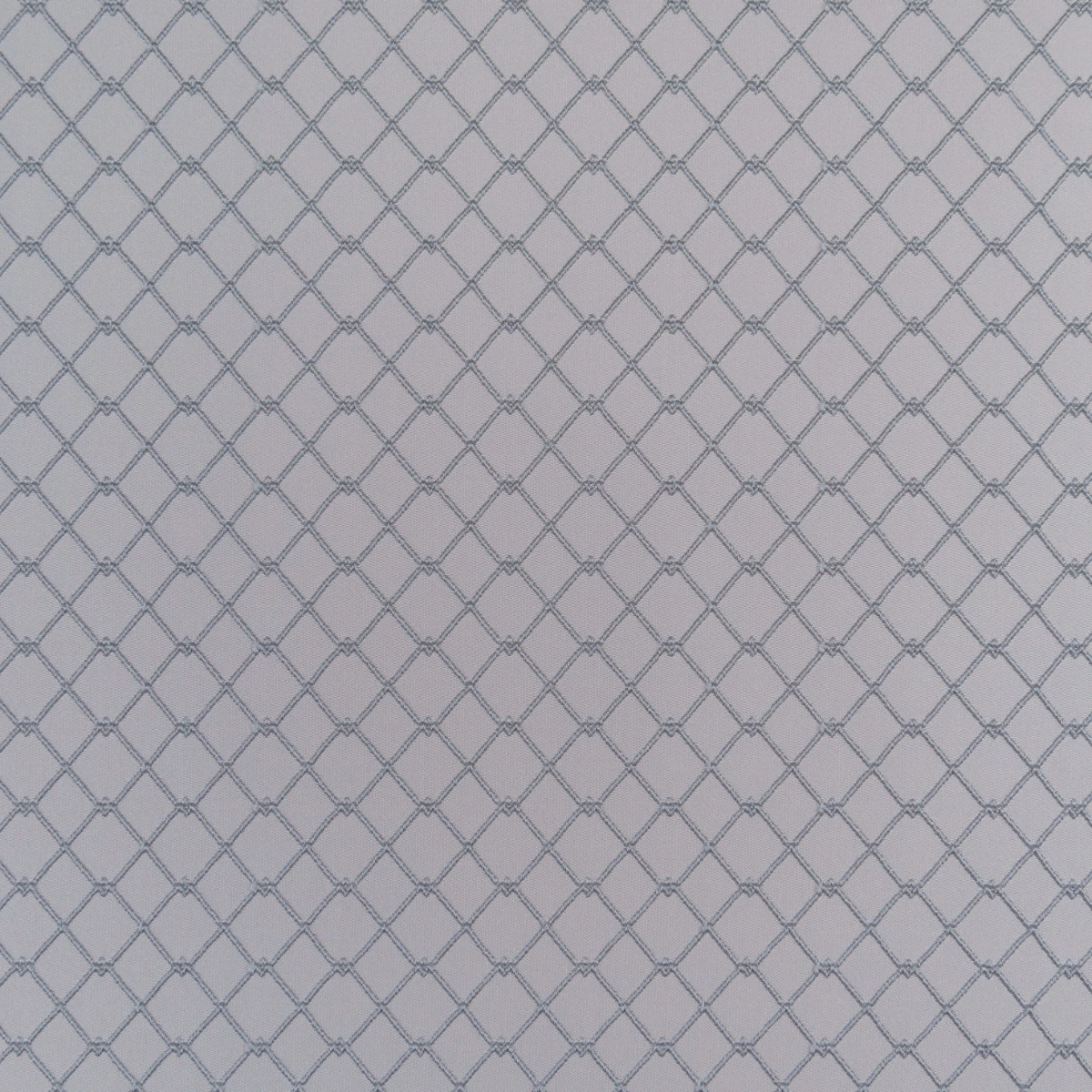 Szürke alapon ezüstös szürke geometria mintás design sötétítő függöny textil anyag