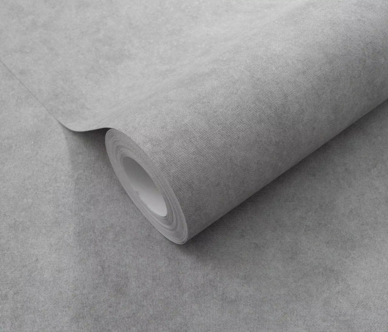 Szürke egyszínű textil hatású enyhén csillámos design tapéta