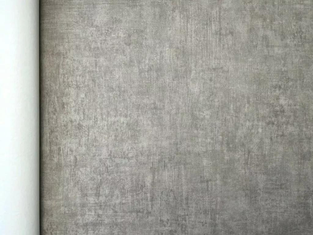 Szürkésbarna betonhatású vlies dekor tapéta