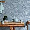 Tengeri csiga és korall mintás kék színű elegáns design tapéta