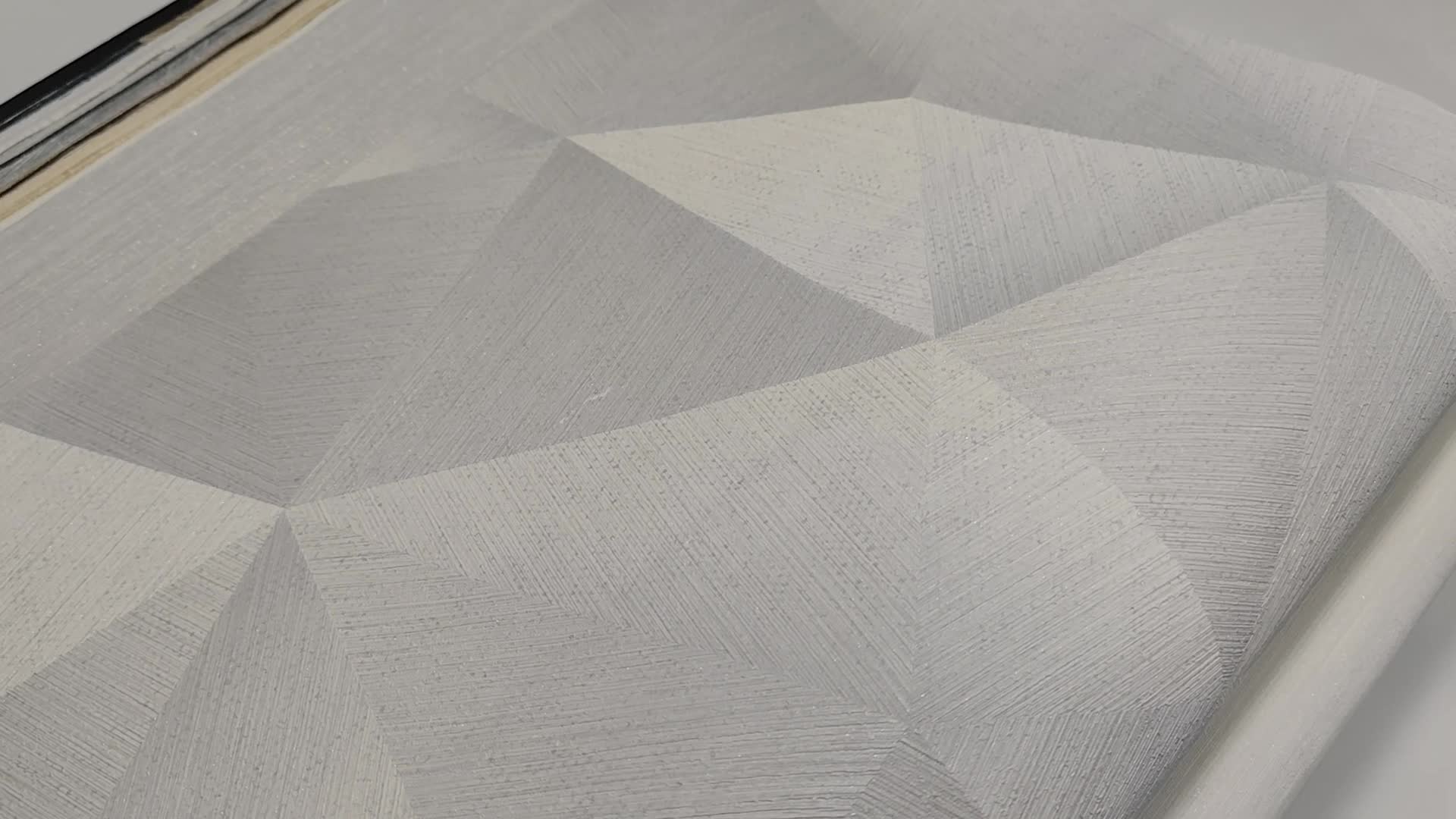 Szürke geometrikus 3D hatású vlies design tapéta