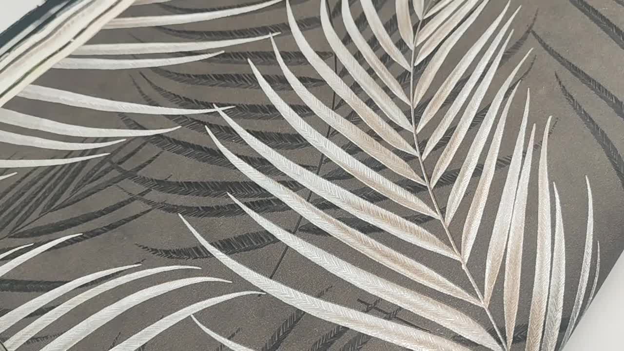Fekete ezüst pálmalevél mintás vlies design tapéta