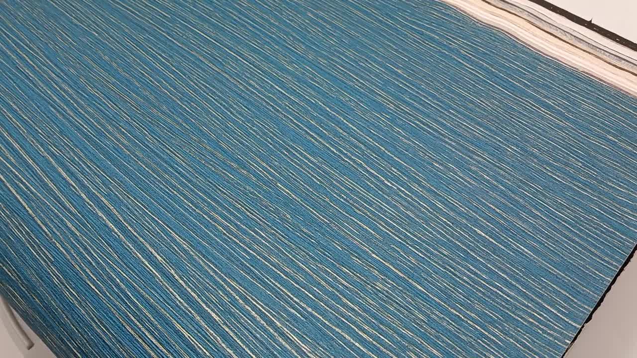 Türkiz design tapéta struktúrált csíkos mintával