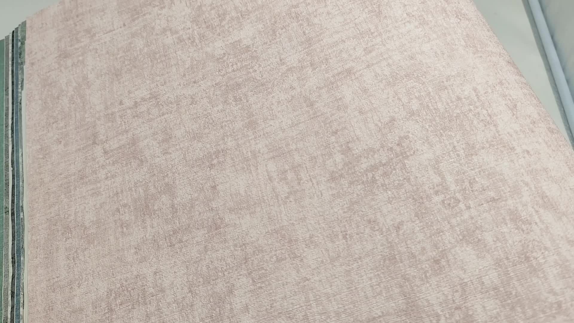 Pasztell rózsaszín finoman struktúrált egyszínű vlies vinyl tapéta