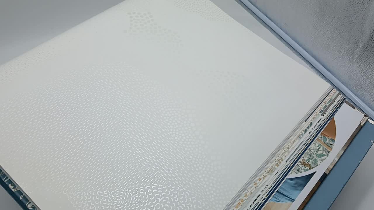 Fehér hullám mintás vlies design tapéta apró pöttyözött hullám mintával