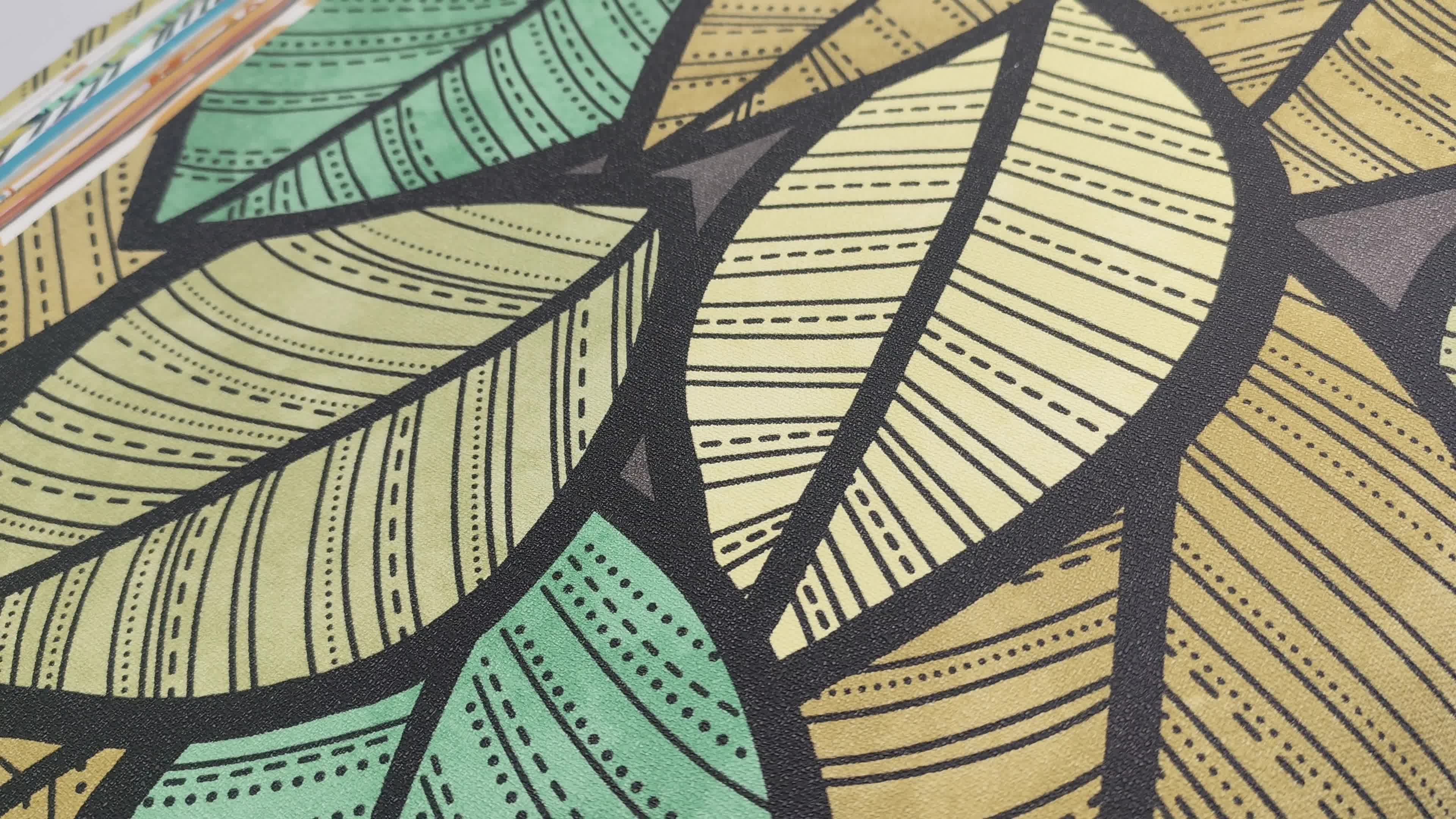 Zöld levélmintás vlies design tapéta textilhatású alap struktúrával