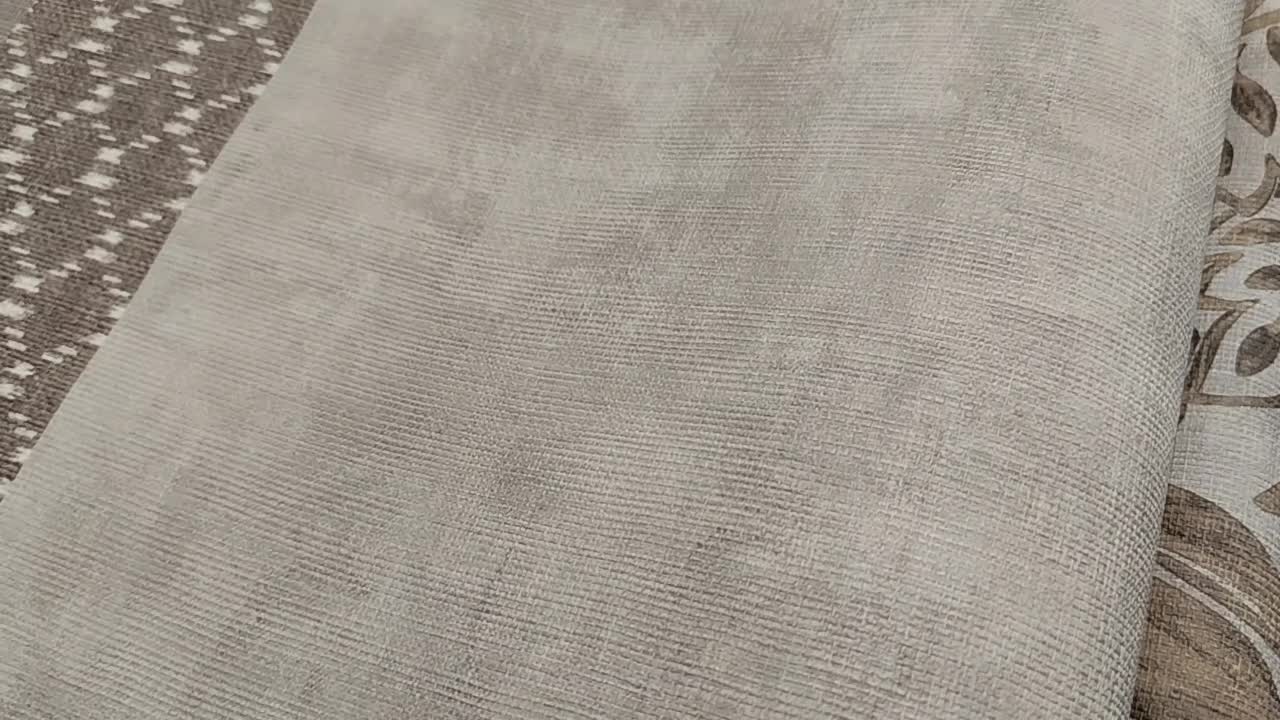 Barna koptatott szövet hatású vlies design tapéta