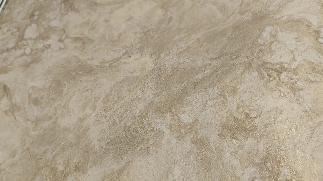 Bézs barna márvány mintás vlies dekor tapéta