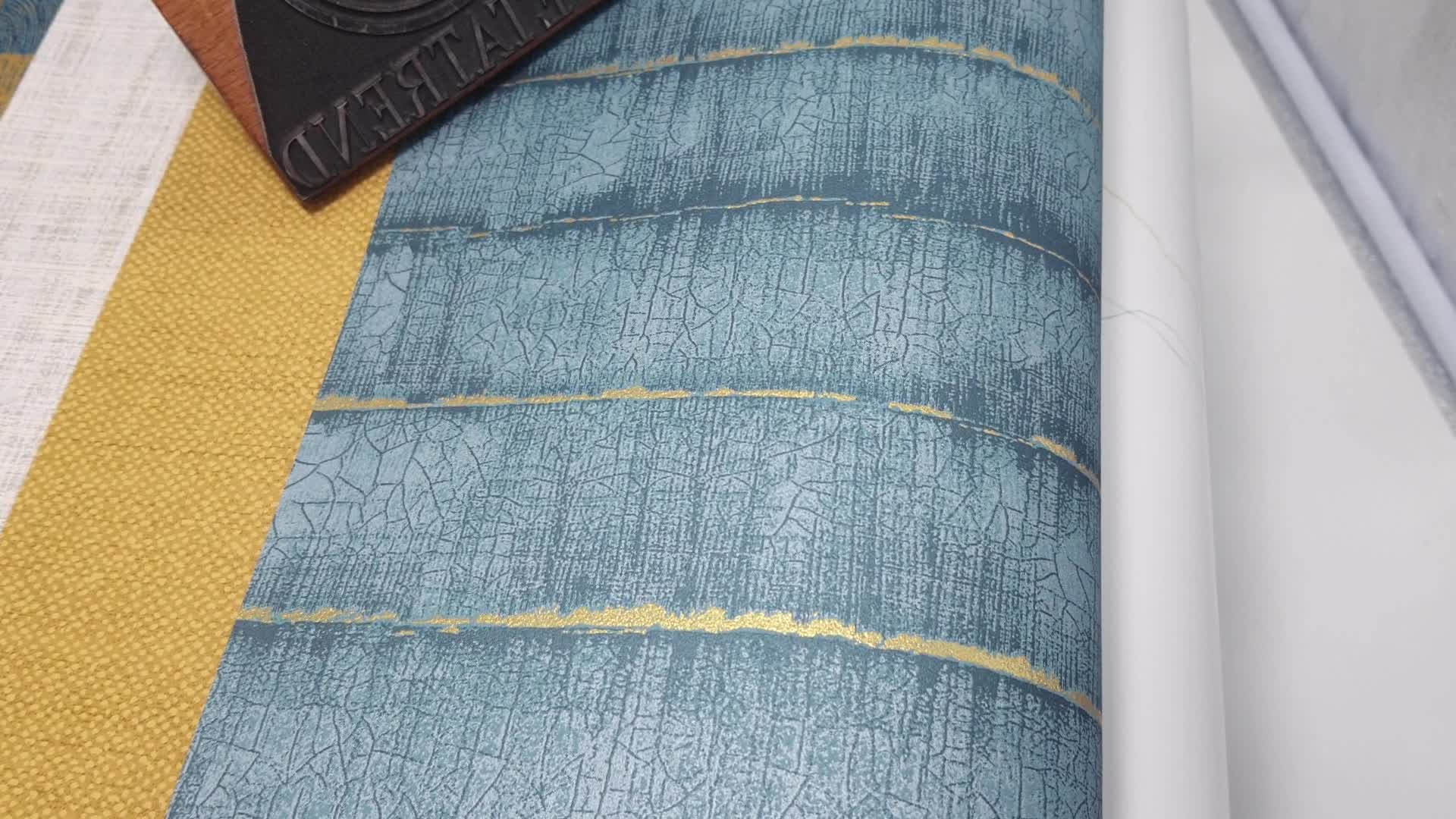 Design tapéta türkiz fahatású geometriai mintával