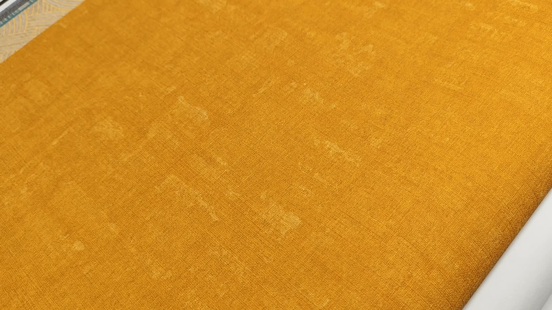 Okkersárga enyhén koptatott hatású vlies design tapéta