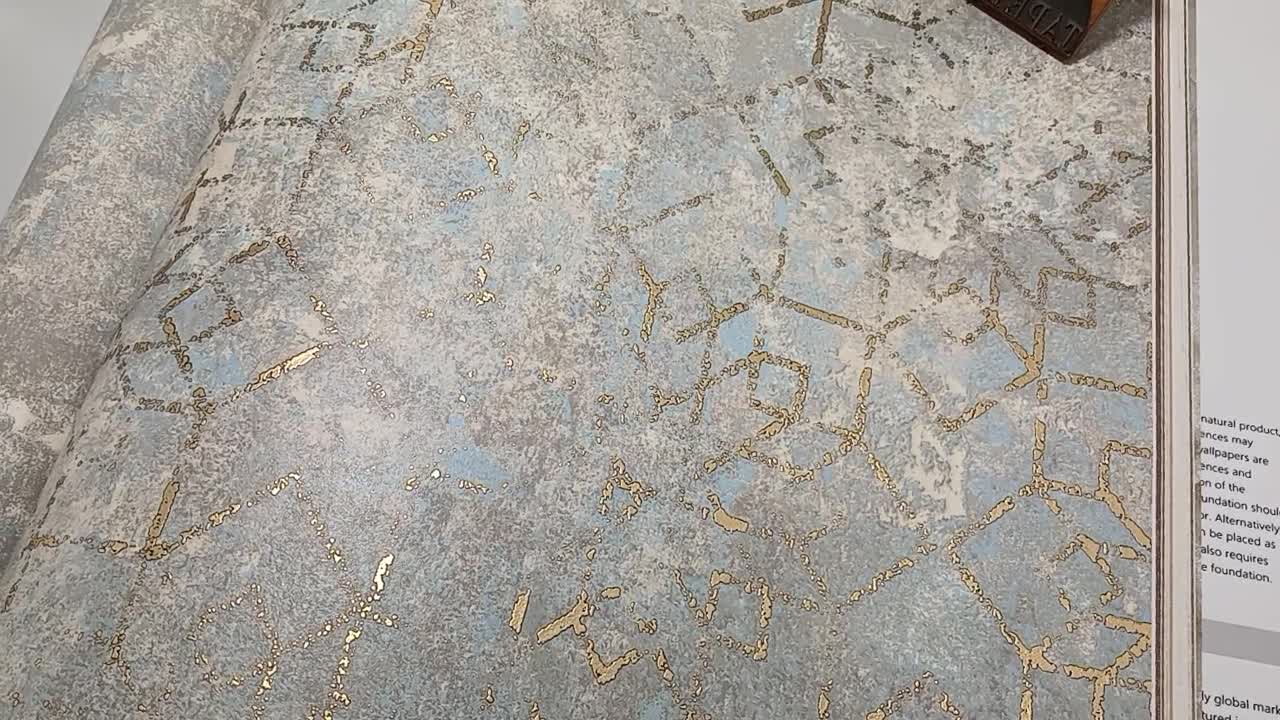 Halványkék metál arany orientális hangulatú absztrakt design tapéta