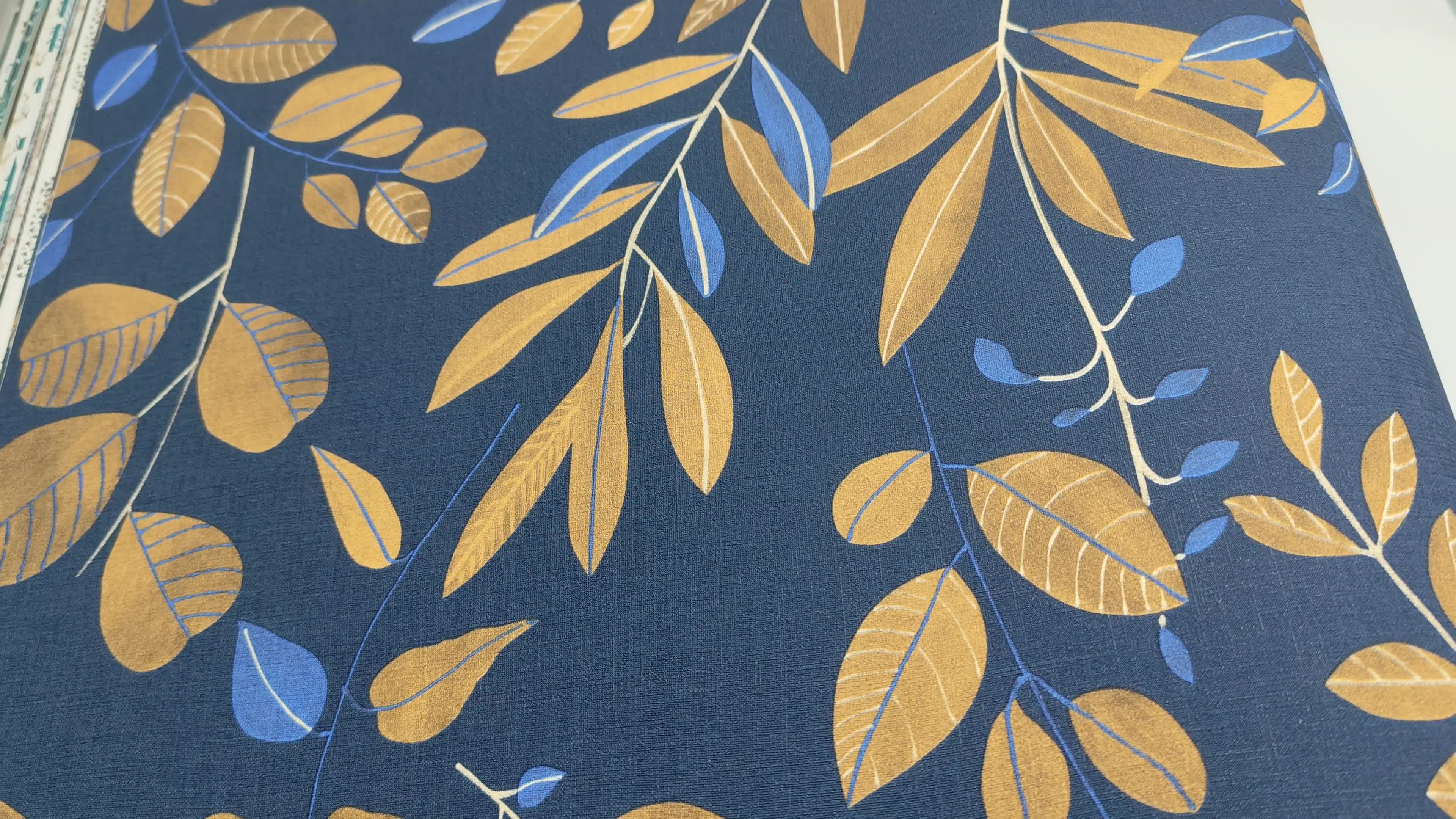 Sötétkék arany levélmintás vlies design tapéta