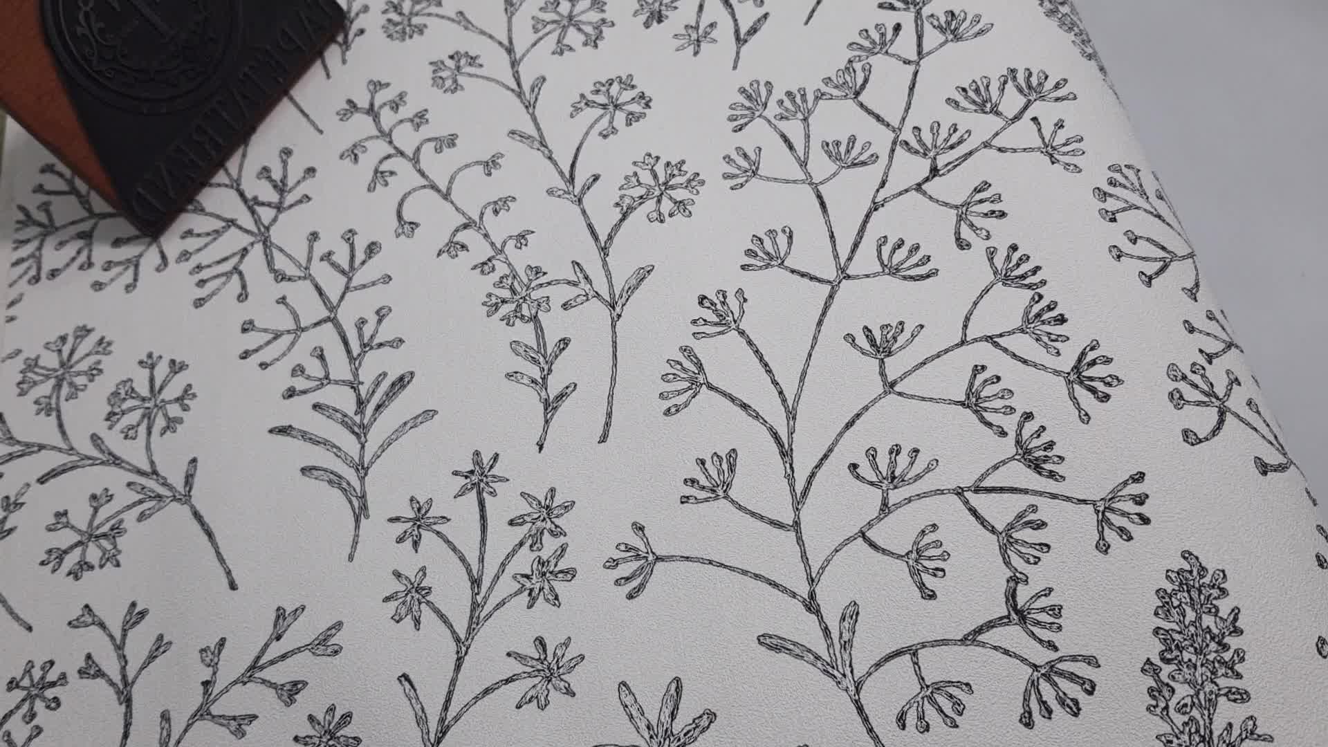 Fekete fehér skandi stílusú mezei virágmintás dekor tapéta