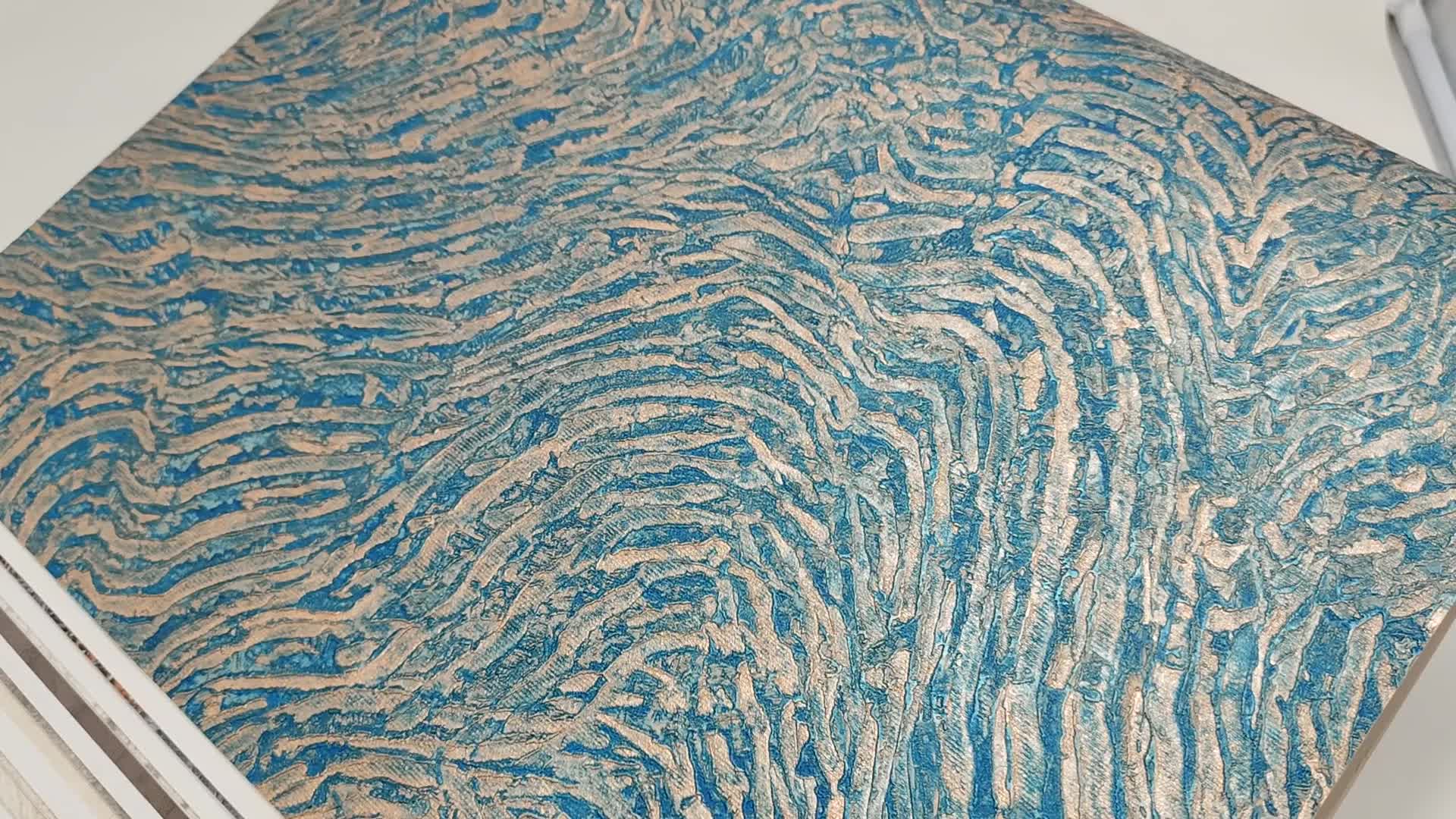 Design tapéta türkiz színben ásvány hatású geometriai mintával