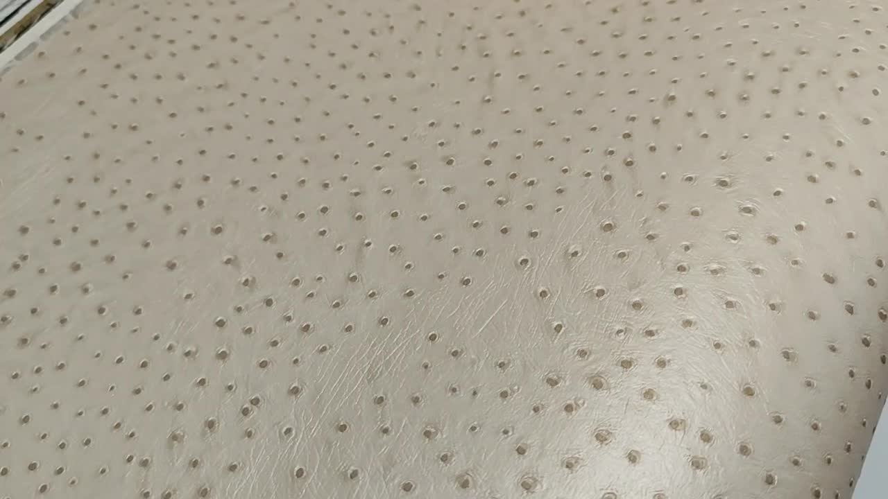 Bőrhatású design tapéta elgáns gyönhyház fényű