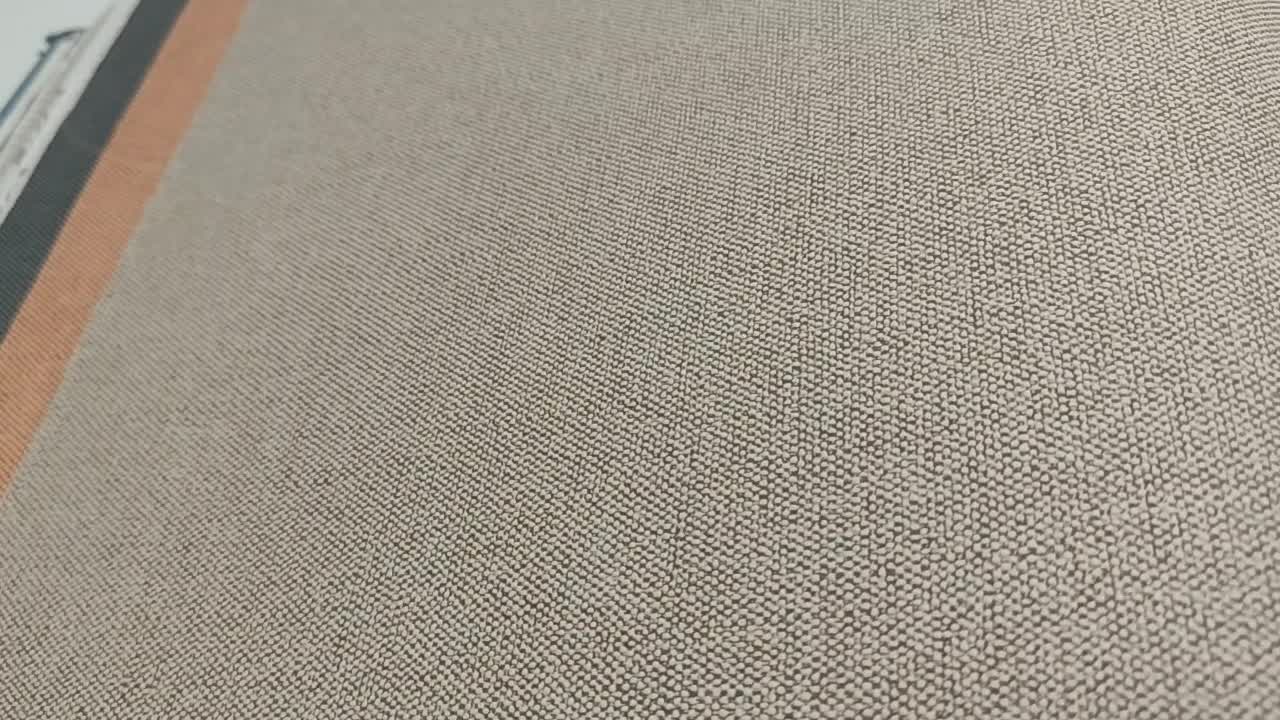 Barnás szürke struktúrált egyszínű habos design tapéta