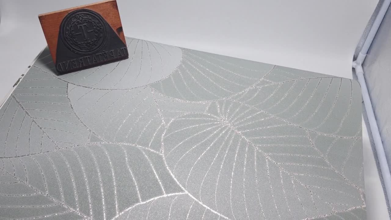 Elegáns levélmintás tapéta metálos fényű levélerezet mintával kékeszöld színben