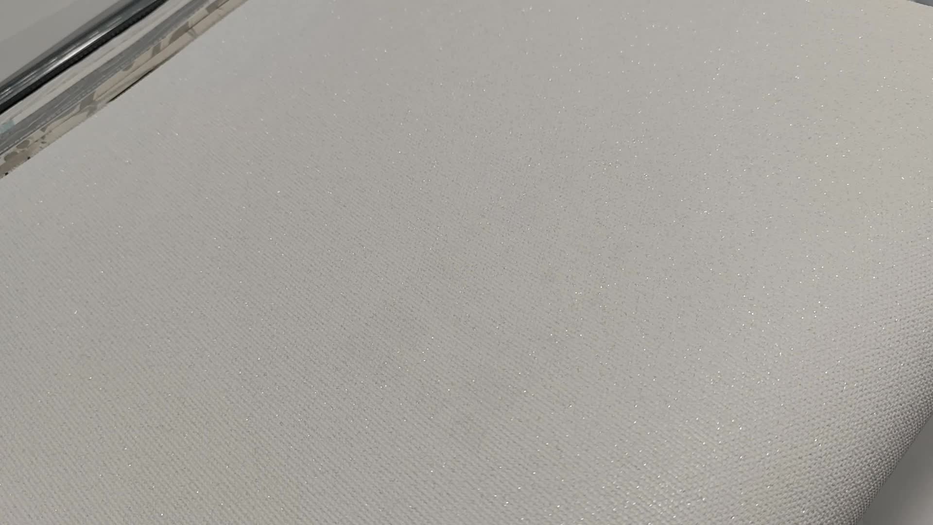 Enyhén csillámos textil hatású krém fehér design tapéta