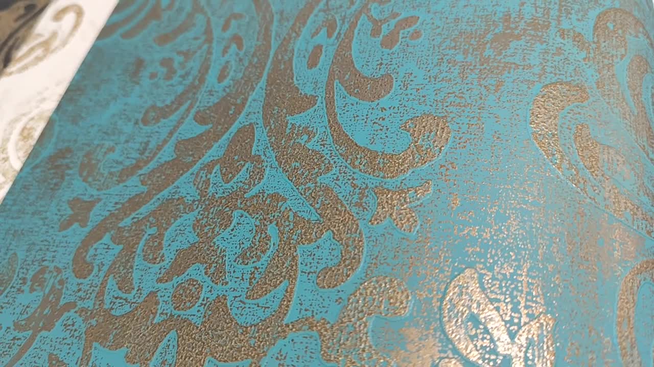 Türkiz vlies tapéta metál arany damaszt mintával