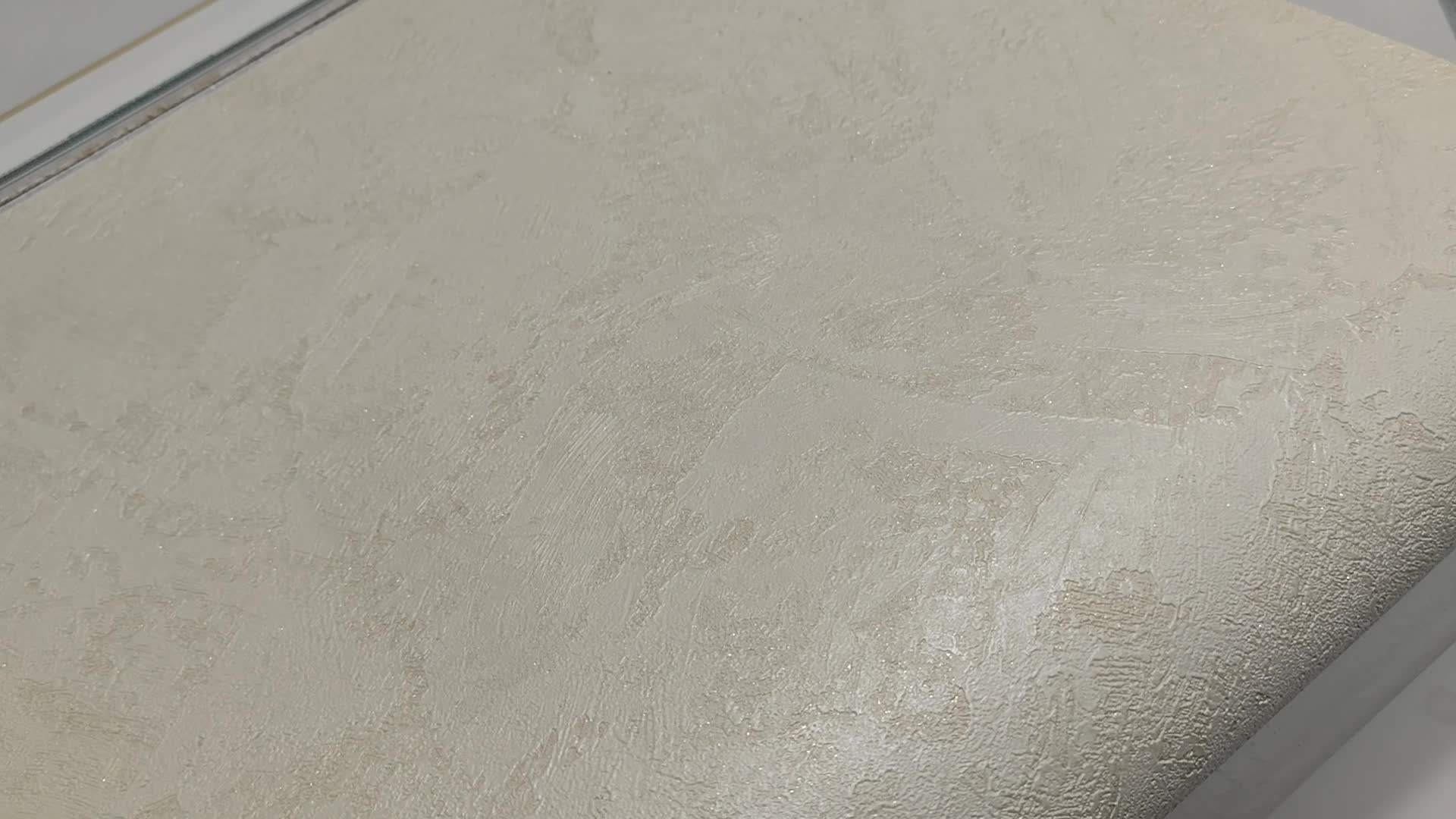 Bézs vinyl tapéta vakolat hatású mintával enyhén csillámos