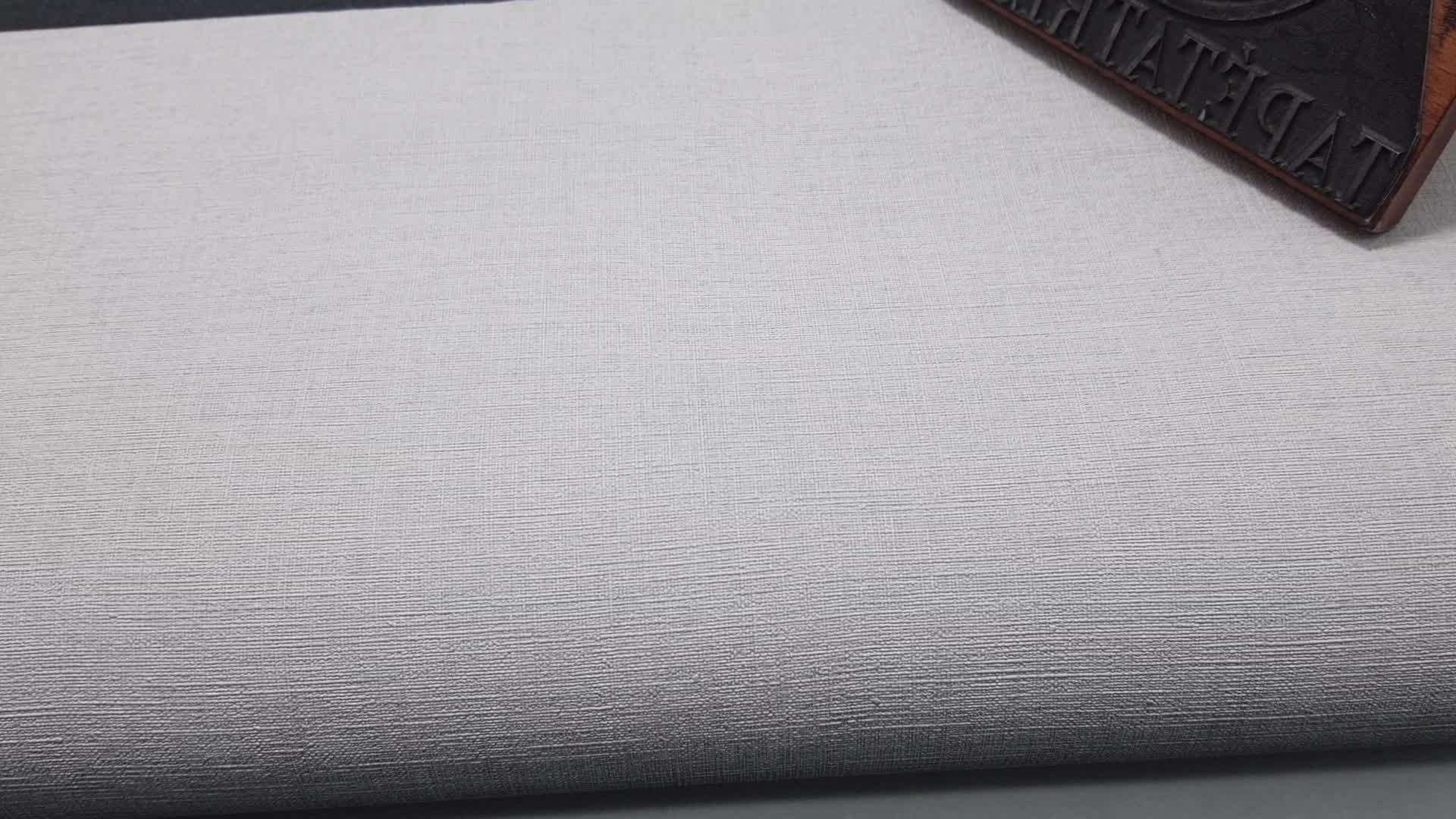 Egyszínű textilhatású szürke design tapéta