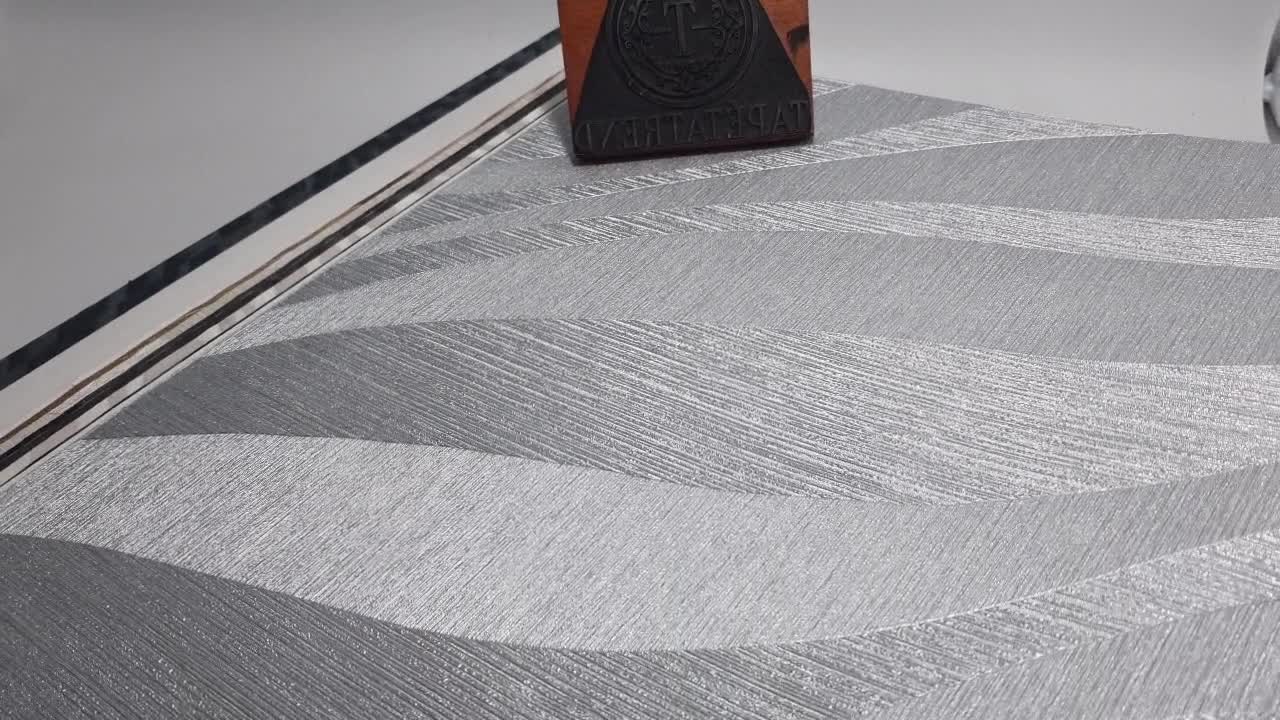 Elegáns ezüst szürke hullám mintás design tapéta