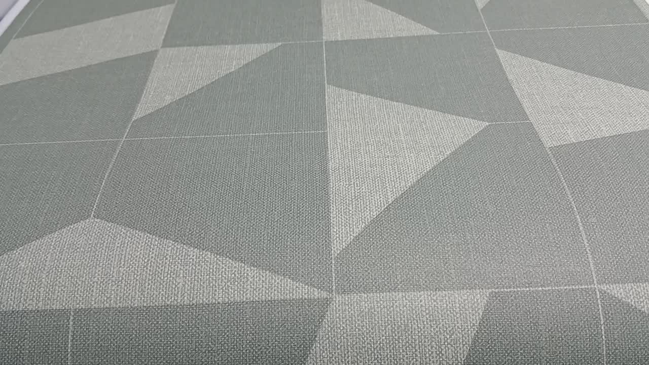 Zöld tapéta geometrikus mintákkal