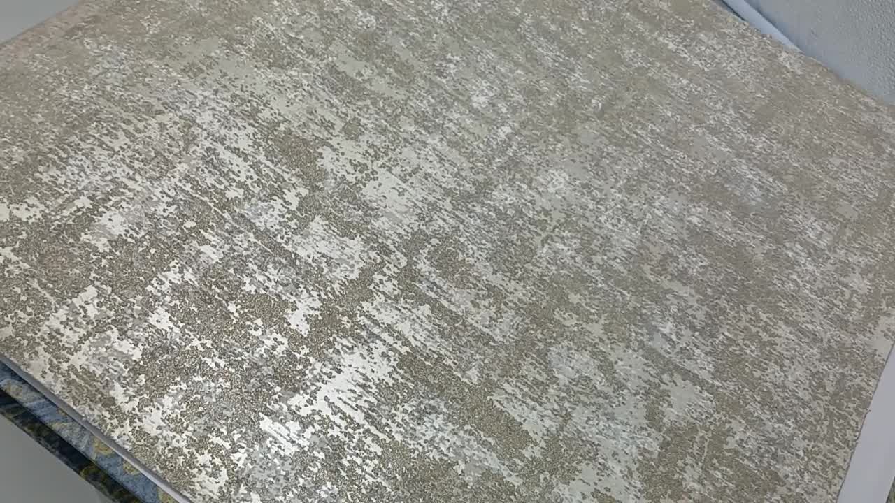 Koptatott üveggyöngy borítású struktúrált design tapéta natúr színekben