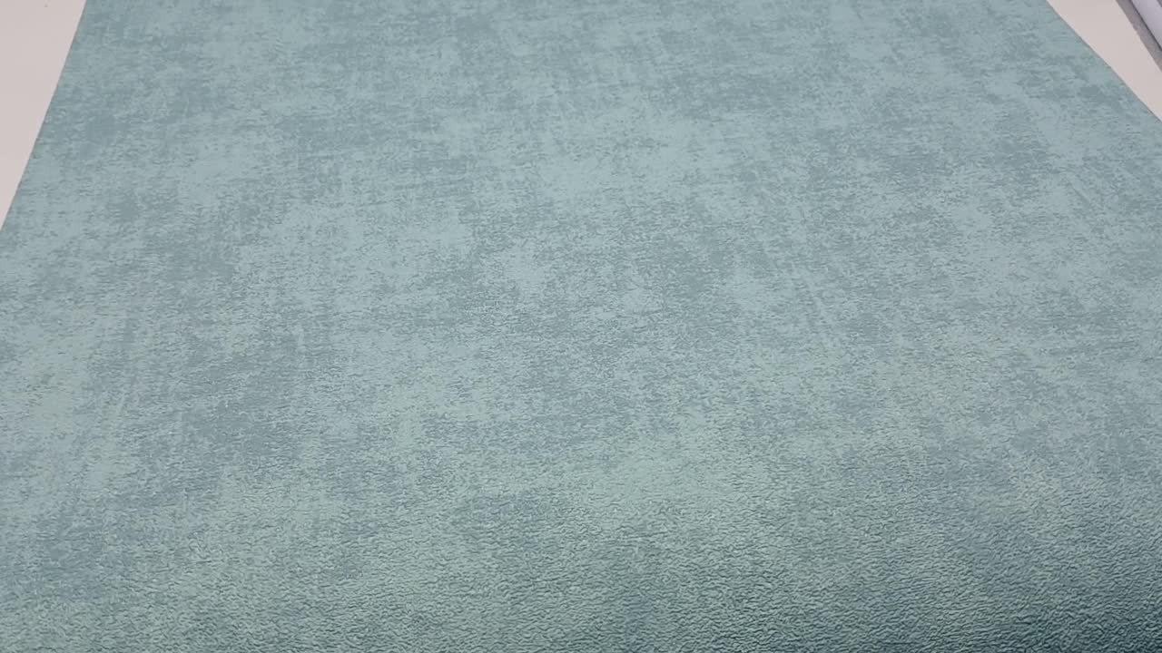 Türkiz egyszínű vinyl tapéta betonos mintával