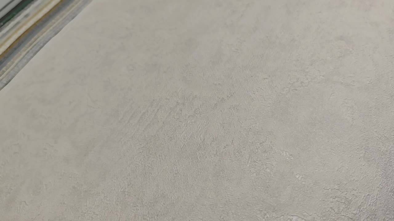 Betonhatású vinyl tapéta halvány rózsaszín színben