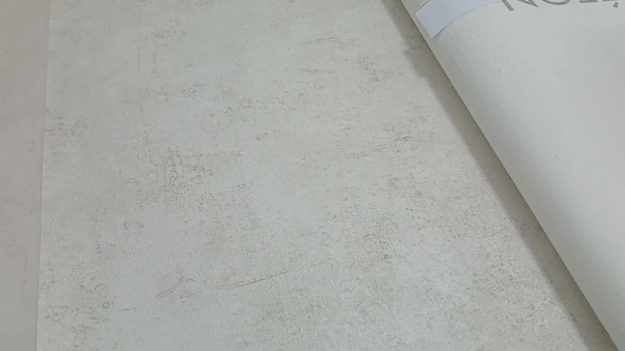 Enyhe beige betonhatású metál koptatású vinyl design tapéta 