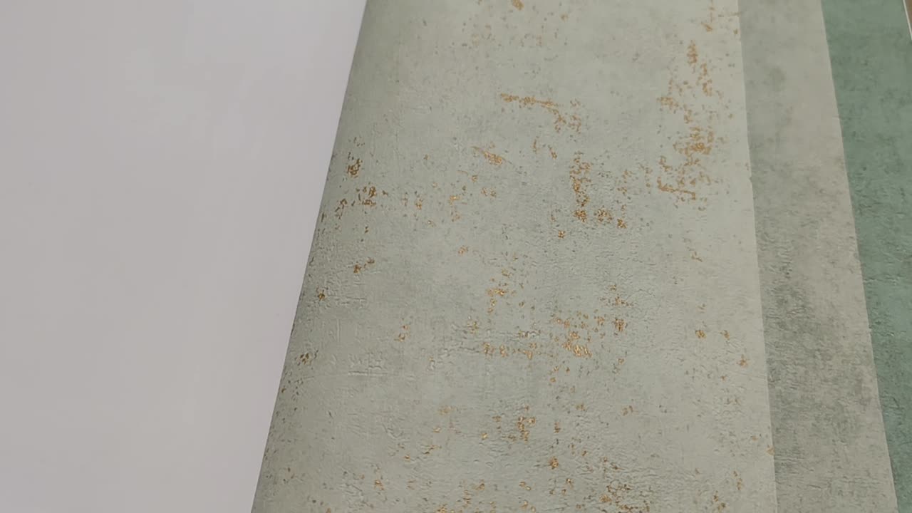 Mandulazöld betonhatású vinyl tapéta arany bekoptatással