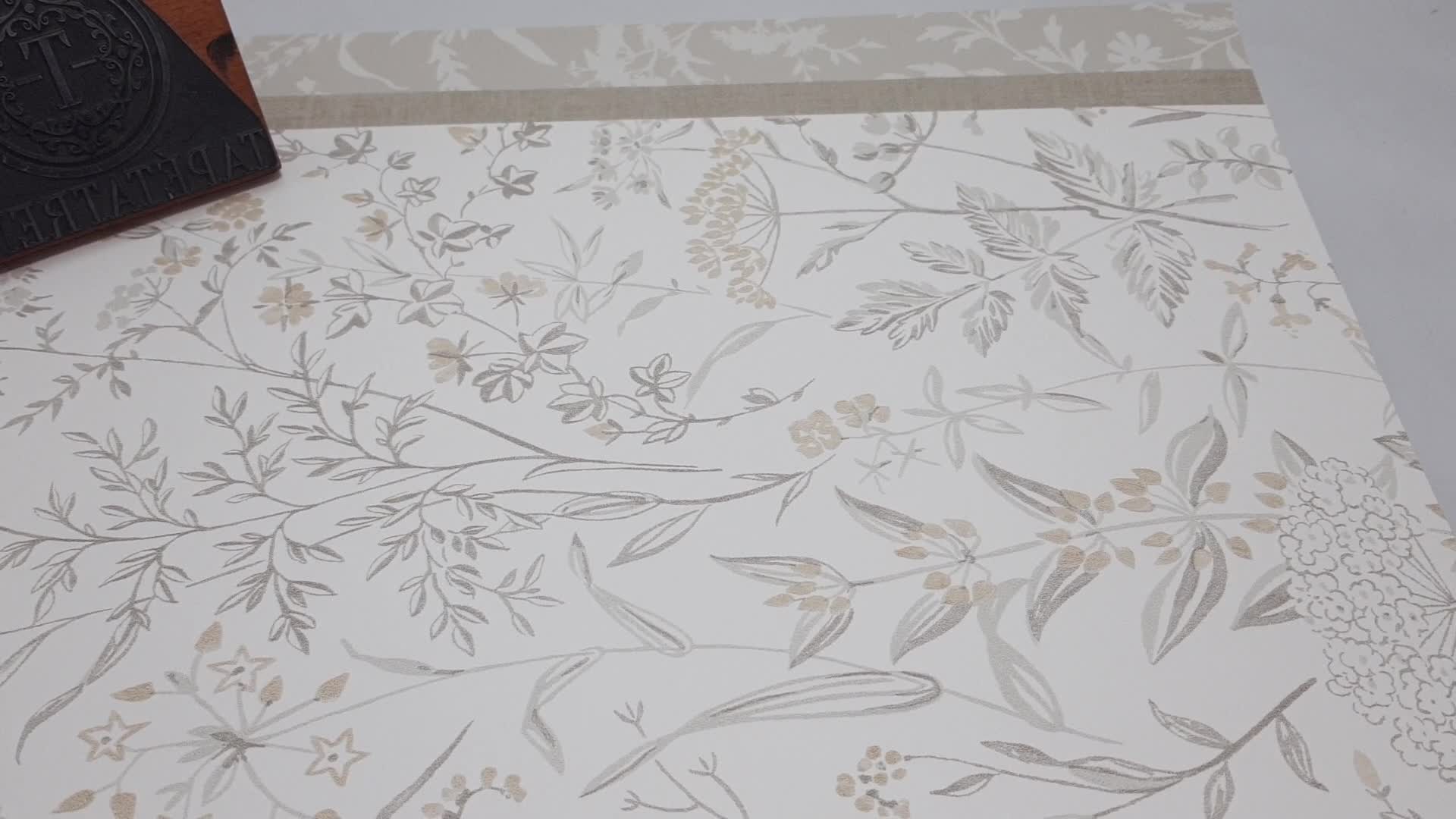 Skandi design tapéta szürekés mezei virágos mintával