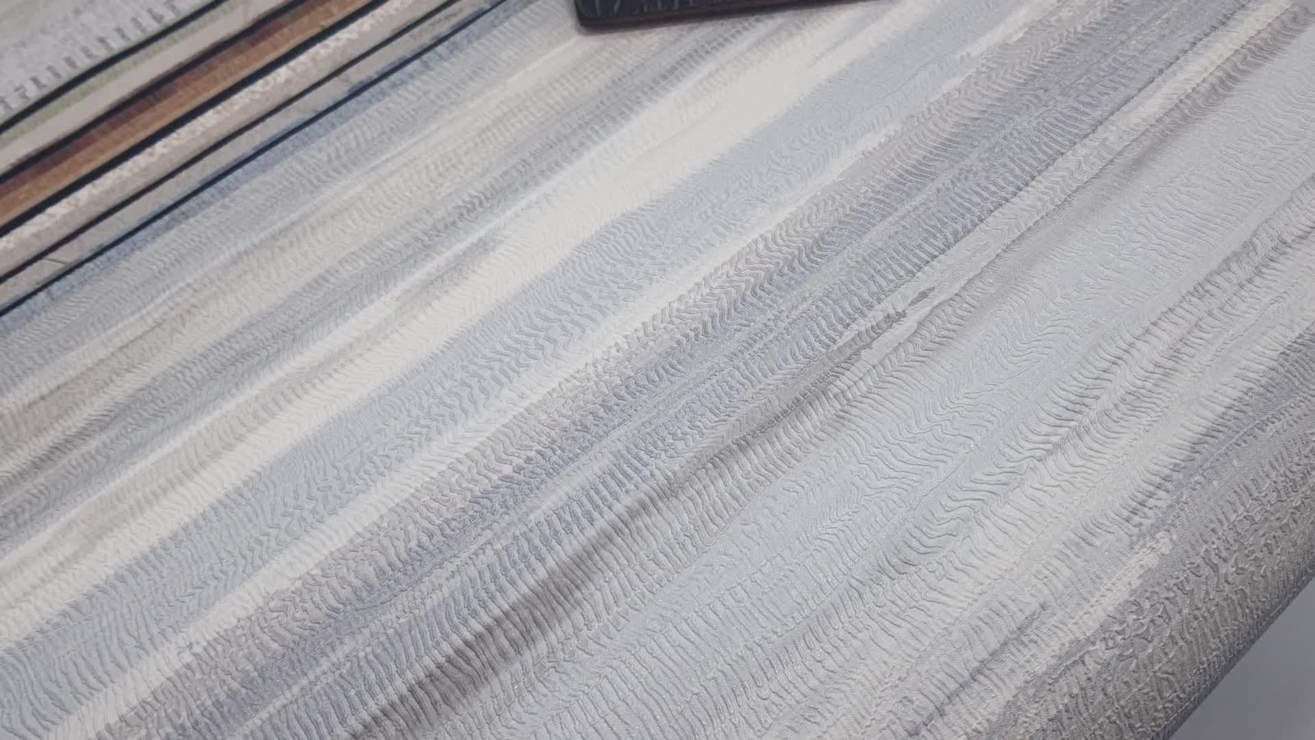 Koptatott kékes szürke csíkos design tapéta