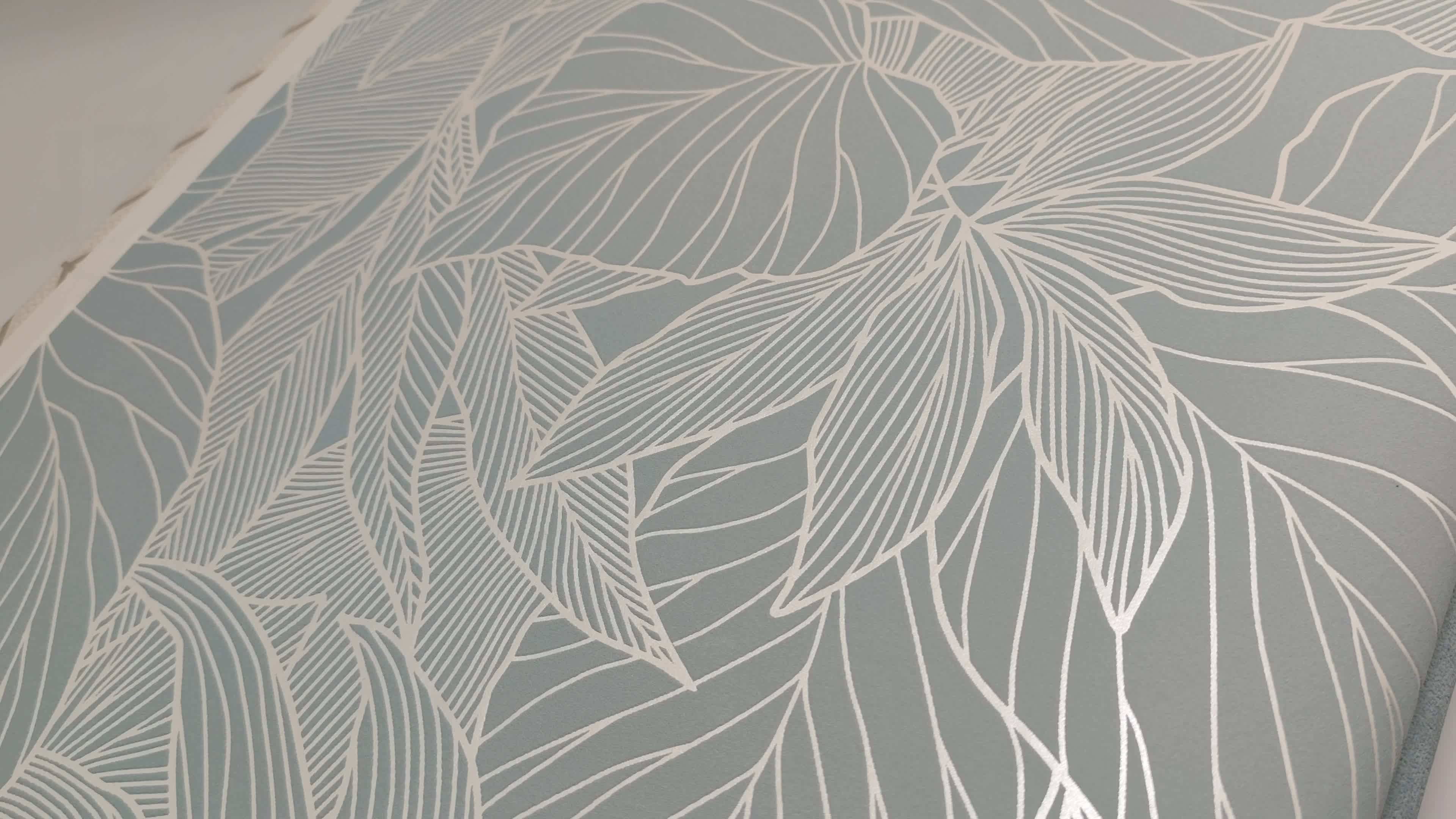 Dekor tapéta halványkék levél mintával anyagában mintás