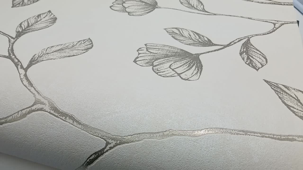 Anyagában virág mintás halvány beige alapon metálos arany design tapéta