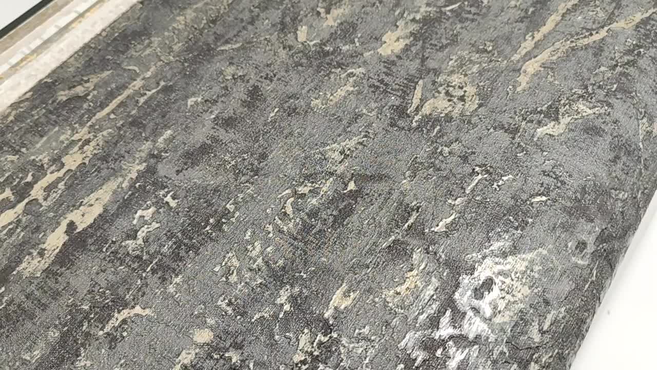 Fekete színű luxus tapéta koptatott fémes felülettel