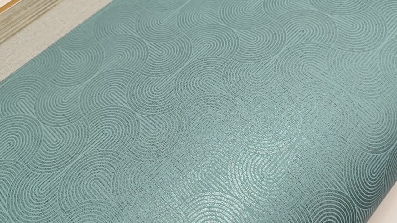 Türkiz tapéta finom geometrikus mintával