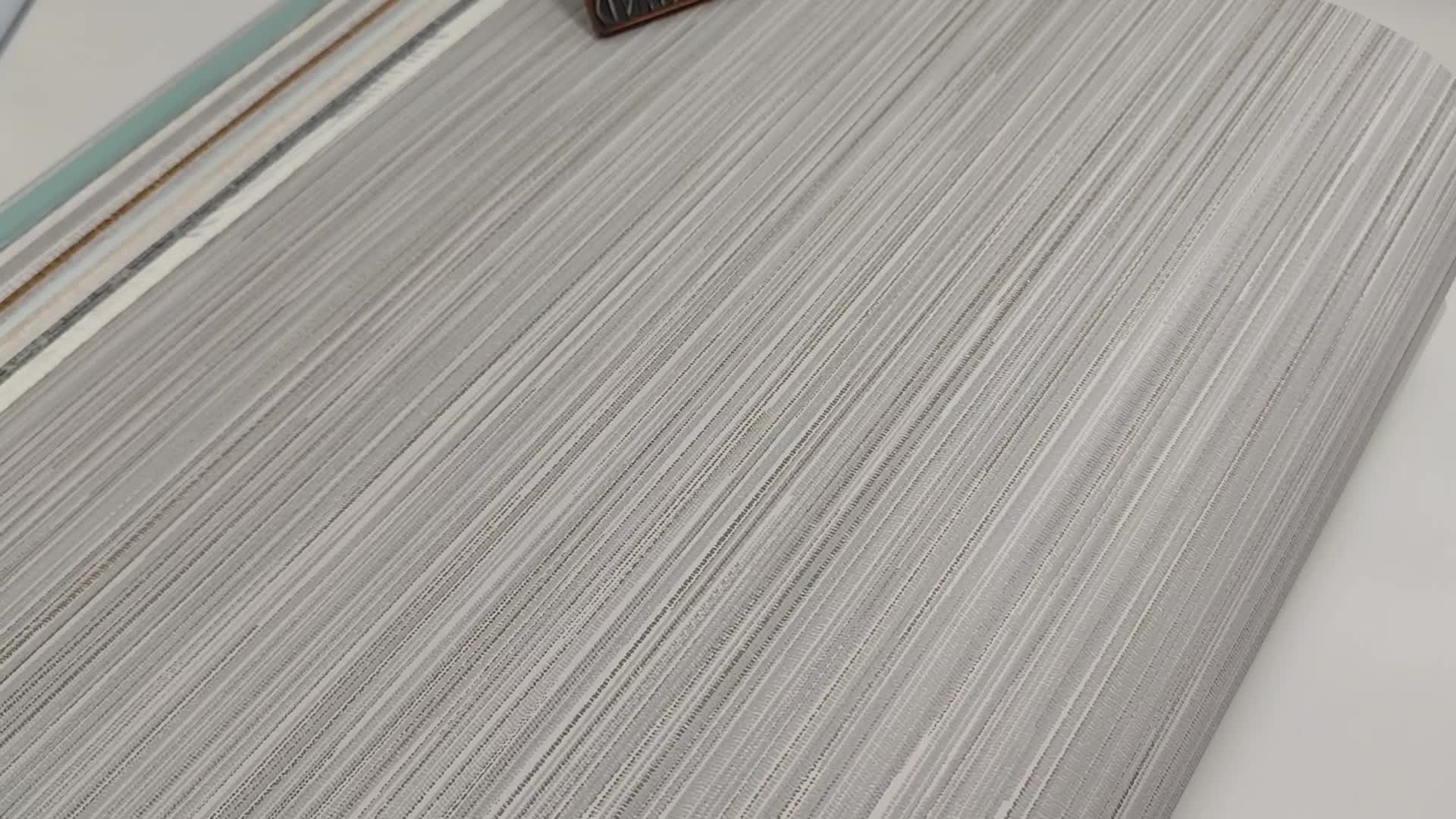 Struktúrált szürke csíkos mintás design tapéta