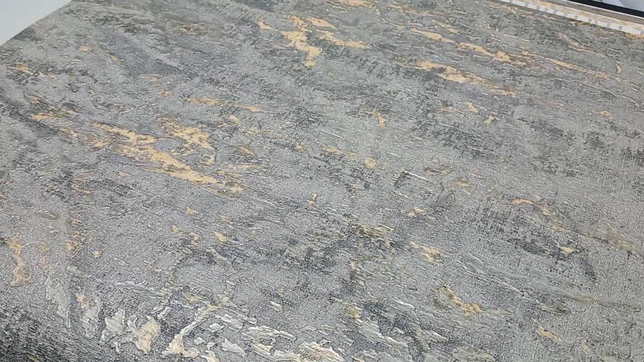 Szürkés színű luxus tapéta koptatott arany felülettel