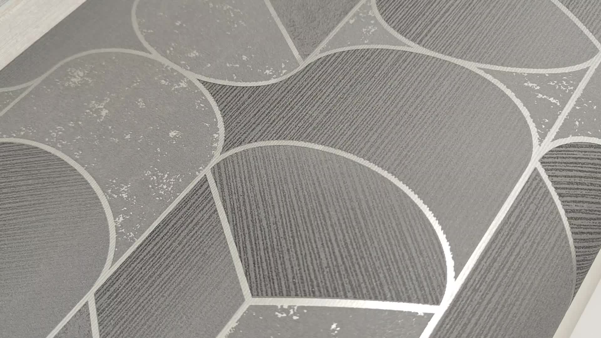 Geometrai mintás design tapéta sötét szürke színben metálos díszítéssel