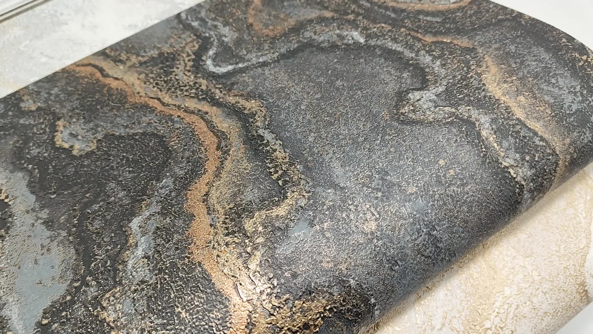 Márvány mintás vinyl tapéta fekete arany színben