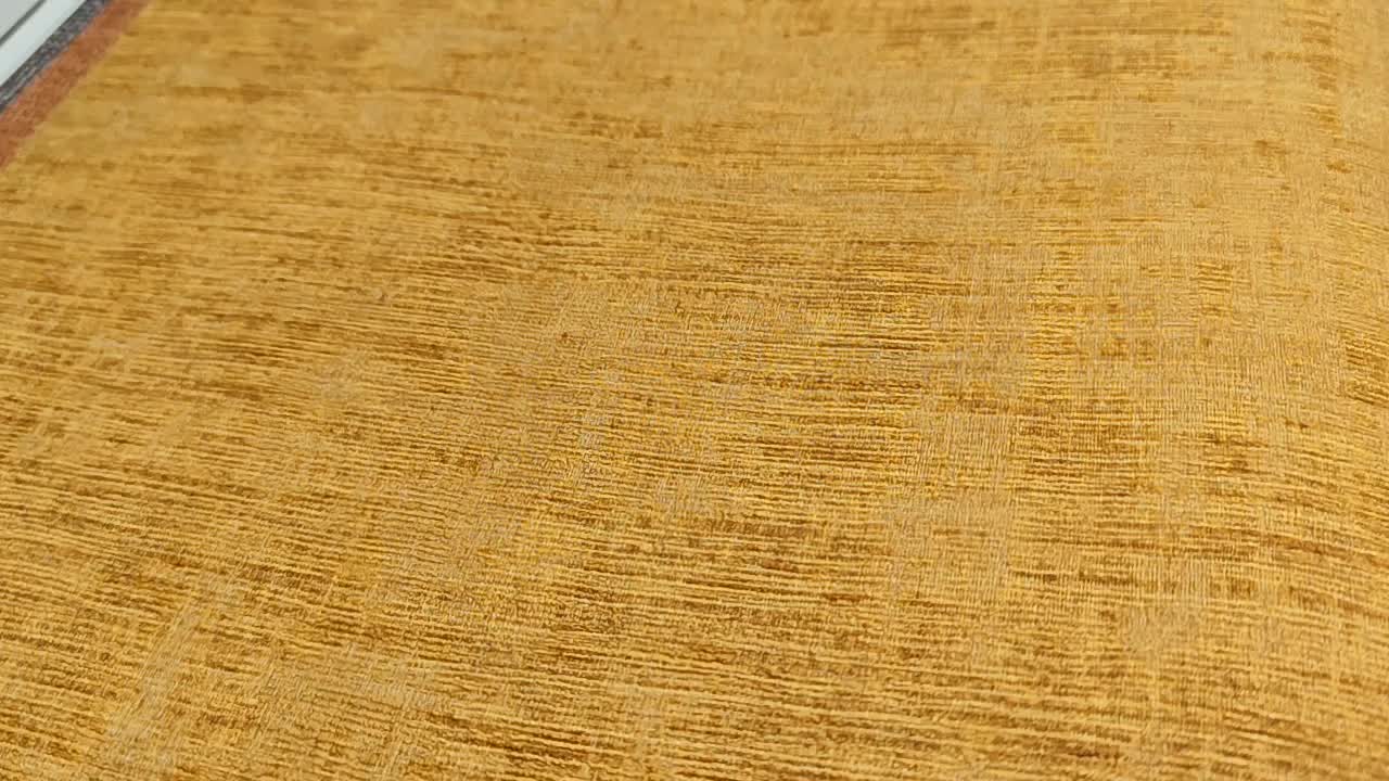 Okkersárga luxus Casamance design tapéta textil mintával