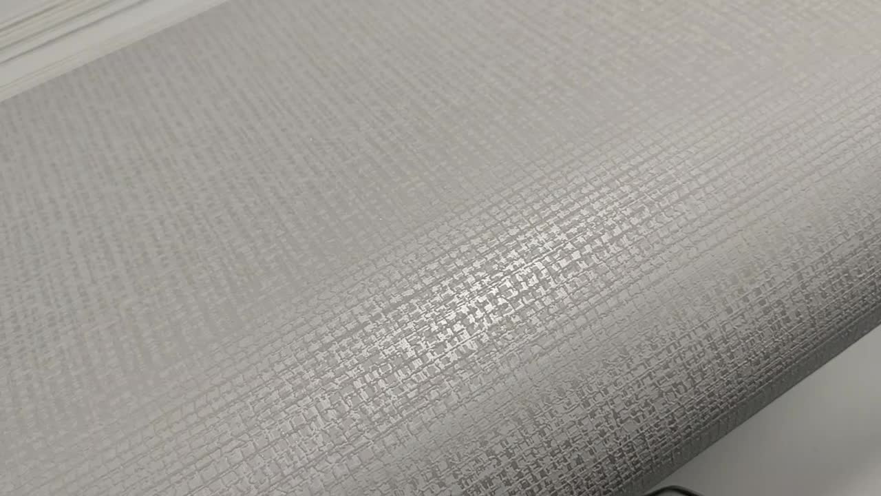 Vlies dekor tapéta ezüst metálos hatással textil struktúrával